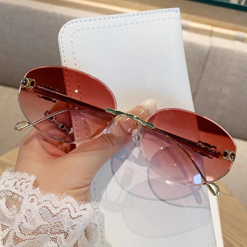 New Oval Metal Frameless Sunglasses Men'S And Women'S High-End Retro Fashion Sunscreen Glasses Uv400 Shades Eyewear