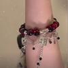 Kinesisk stil rød krystall fjær kors anheng armbånd for jenter kvinner vintage elastisk perler kjede armbånd smykker gaver