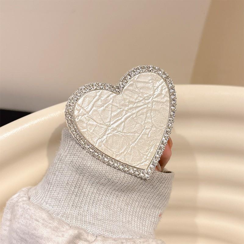 

Korean Style Temperament Light Luxury Metal Heart Water Diamond Thick Shiny Piece Phone Holder Personality Niche Internet Celebrity New Airbag