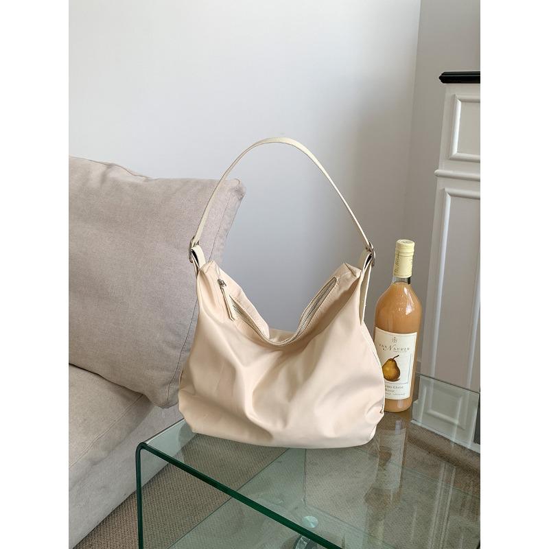 

New shoulder bag large capacity niche design sense college student tote bag class commute leisure nylon bag бежевый