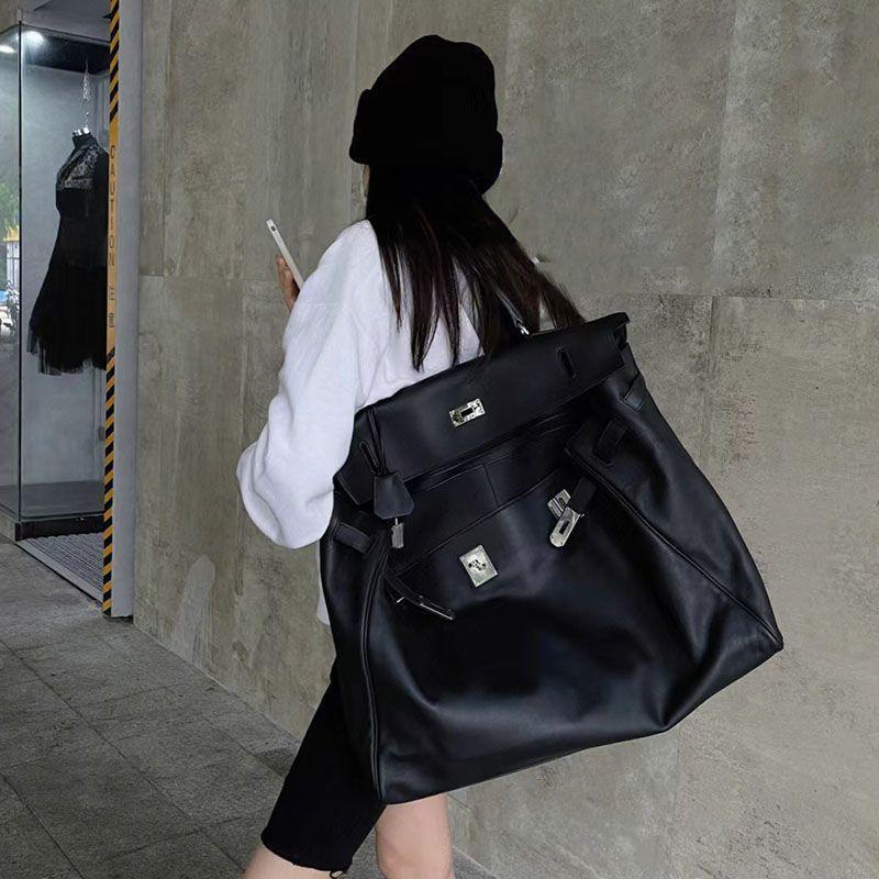 

Yi Jinyuan 2023 Business Trip Luggage Bag Black Silver Platinum Genuine Leather Large-capacity Kelli One-shoulder Female