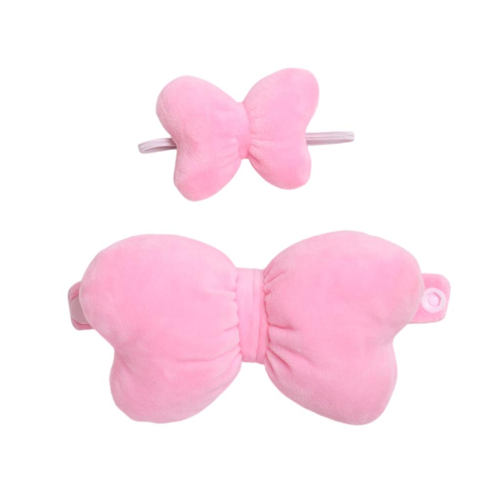 A Pair Of Cute Baby Clothes With Big Bow Accessories