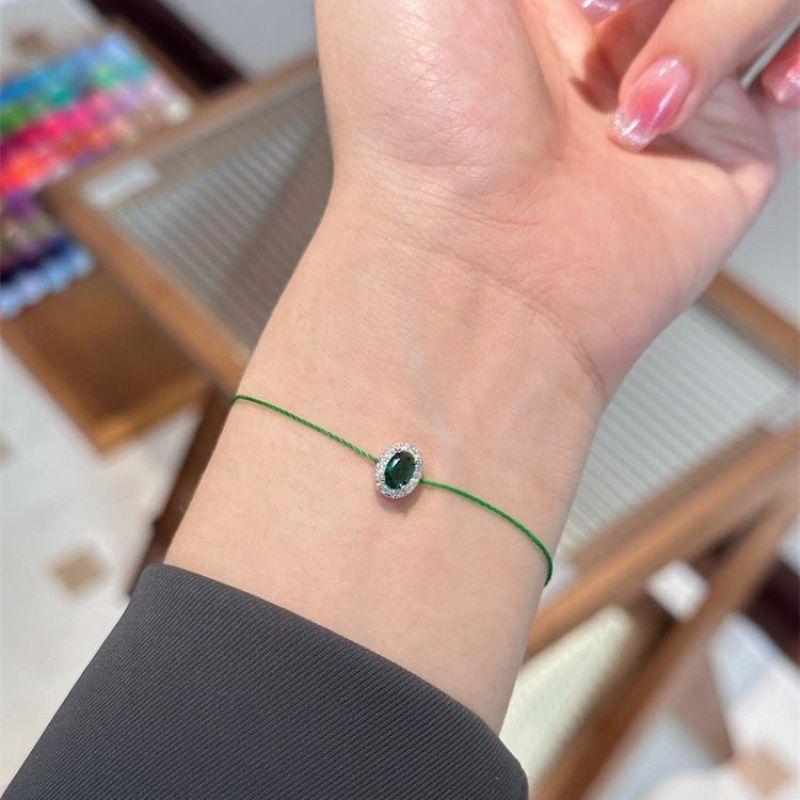 

925 Silver Plated Emerald Rhinestone Woven Hand Strap Women s Accessible Luxury Ins Special-Interest Design Exquisite and Versatile Fancy Bracelet Emerald Hand Rope White Gold