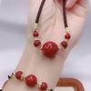 Red Agate Cinnabar Acacia Bean Necklace with Cat's Eye Gold Thread Clavicle Chain.