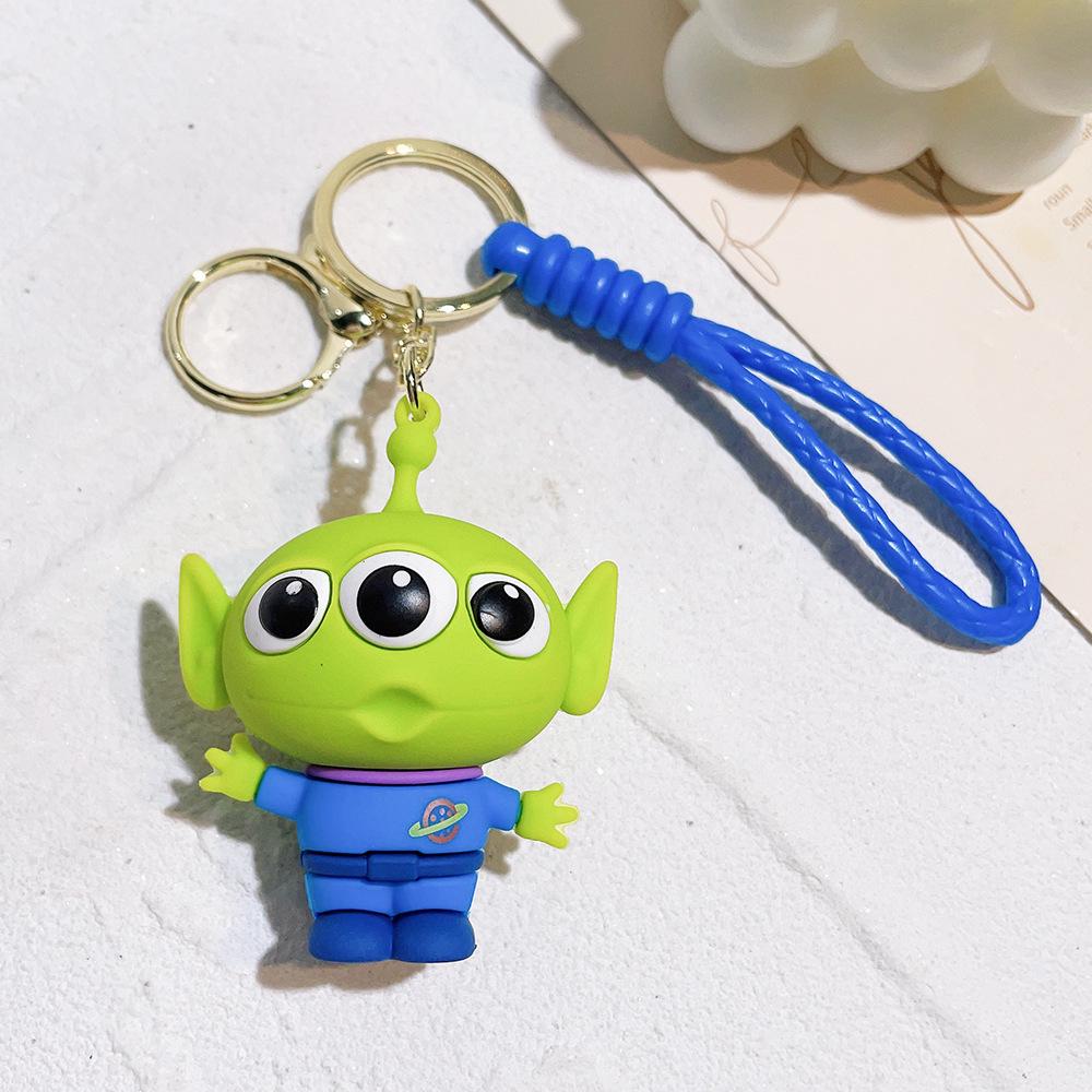 Best-Selling Toy Story Figures Keychain: Three-Eyed Alien, Buzz Lightyear, and Strawberry Bear Charms