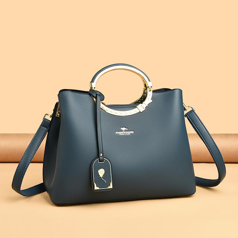 This Elegant and Sophisticated Handbag Is A Soft Leather Single-shoulder Crossbody Bag