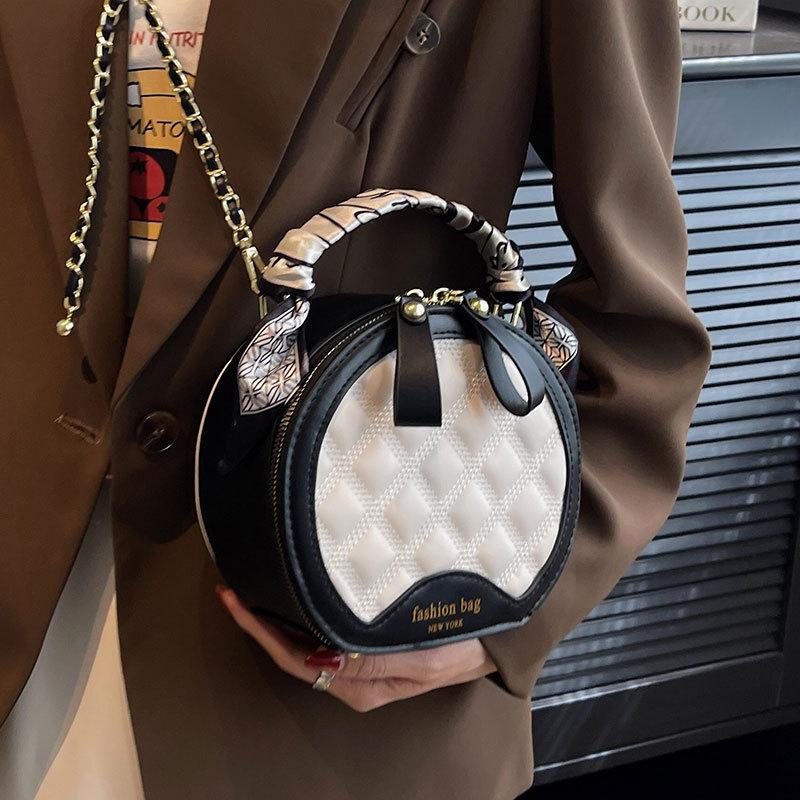 2025 high-end temperament light luxury rhombus portable small round bag fashion leisure commuting versatile chain messenger bag women