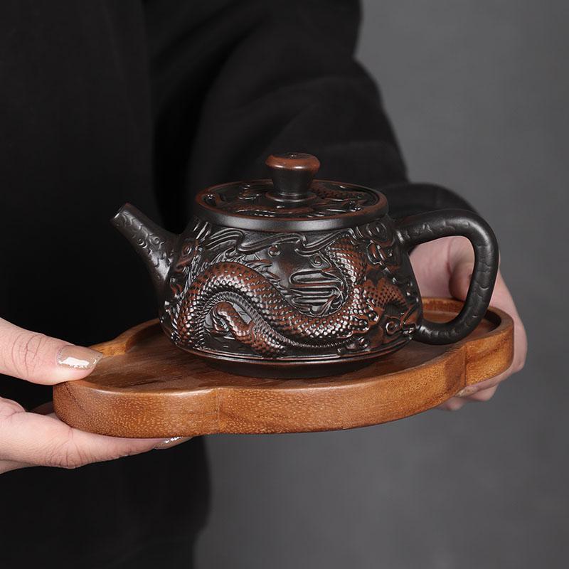 Rotating upside-down aircraft kettle fully carved handmade purple pottery teapot Kung Fu tea set Fengming kettle Xishi teapot