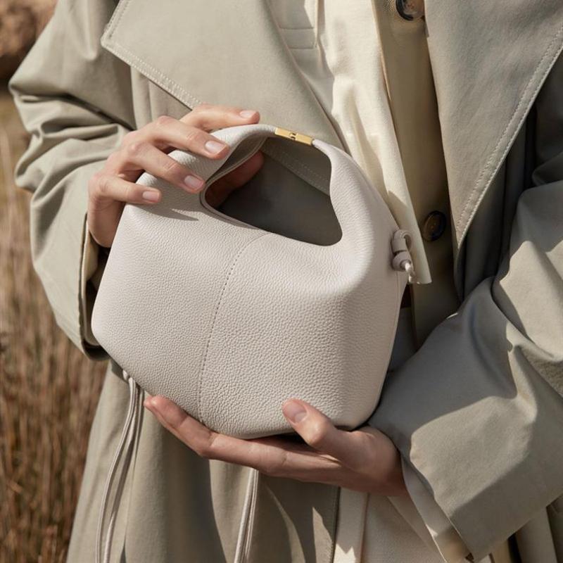 Europeisk amerikansk retro håndveske for kvinner 2024 vår og sommer New Lady Bøtteveske Høykvalitets PU tøyveske Kan håndholdt crossbody og enkelt skulder