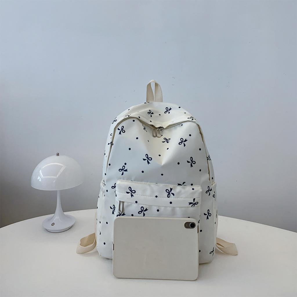 Back To School Backpack Playful Bow Print Bookbag Quilted Comfort and Multi-Pocket Organization System for Women's Campus Life