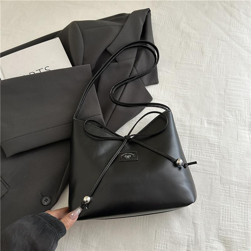 

2025 new sweet strap bow handbag women s Korean fashion casual shoulder bag high value bucket bag