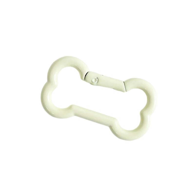 

Artistic Miniature Bone Keychain Pet Accessory Featuring Spring Mechanism And Scratch Resistant Coating