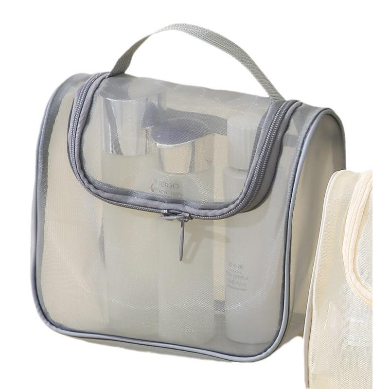 Large Capacity Mesh Makeup Bag: Portable, Multi-functional Toiletry Storage with High-Style Curved Design.