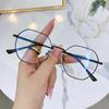 Unisex Octagonal Metal Frame Glasses with Anti-Blue Light and Myopia Prescription.