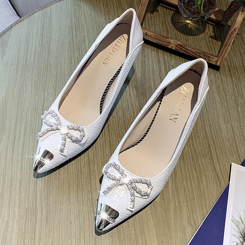 

2025 summer new thin heel pointed metal bow shallow mouth wear with skirt temperament one-pedal single shoes 34