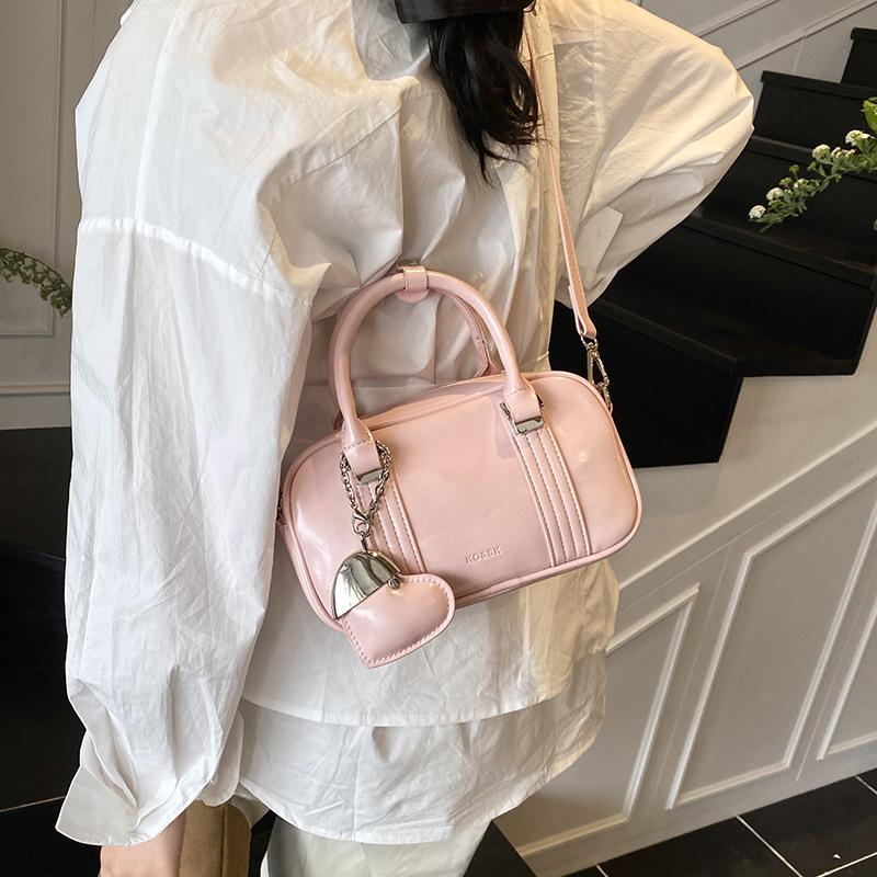 

2025 new work small bag portable bowling bag casual shoulder cross pillow bag