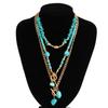 Collana a Strati Geometrica con Perline e Accenti di Pietra Turchese Catena Regolabile per Donna Accessorio di Moda Gioielleria