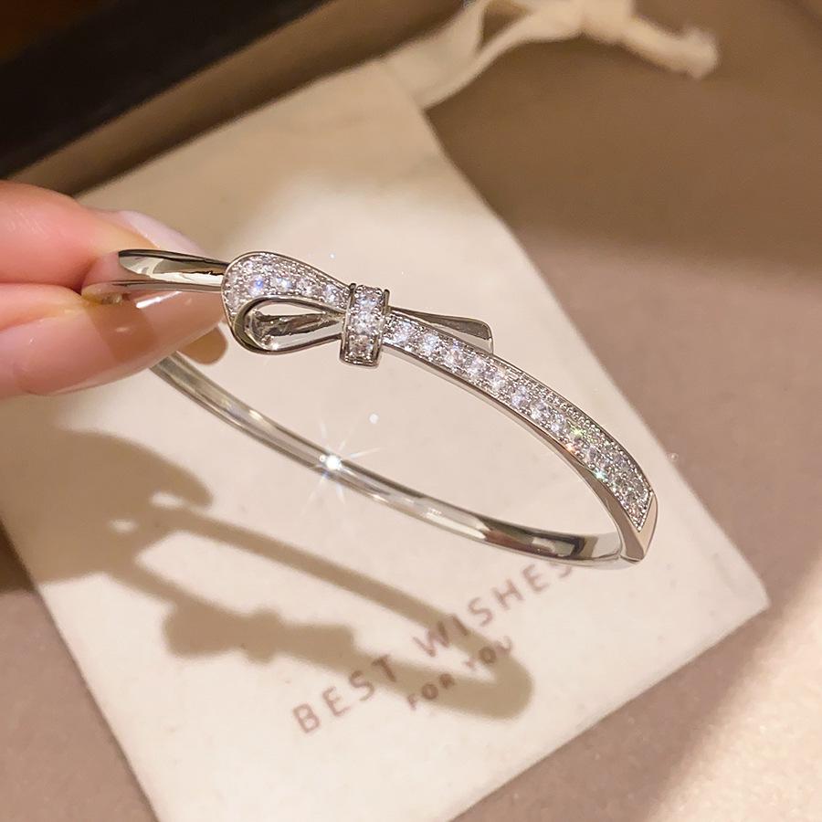 18k Gold Plated Oval Bracelet with Diamond Inlay - Butterfly Knot Design
