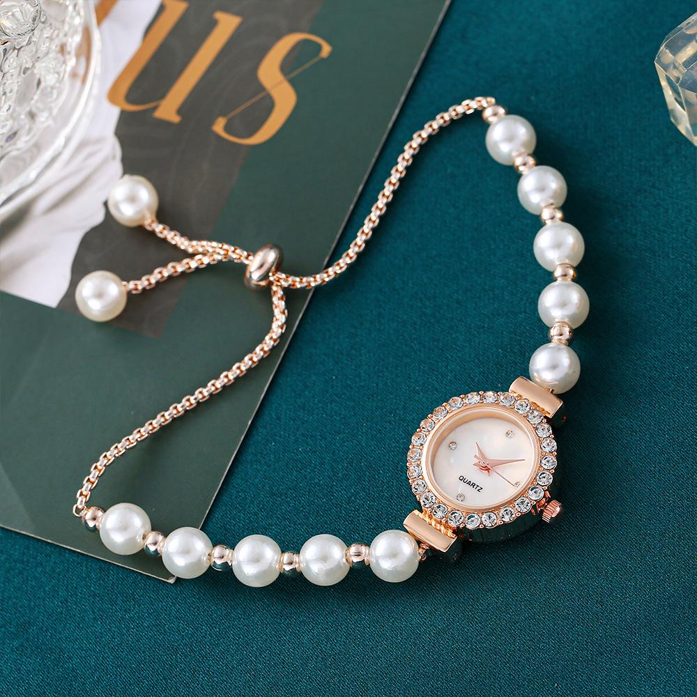 Ladies' white bead bracelet, compact and exquisite with diamond inlaid case, simple rhinestone dial, fashionable quartz watch