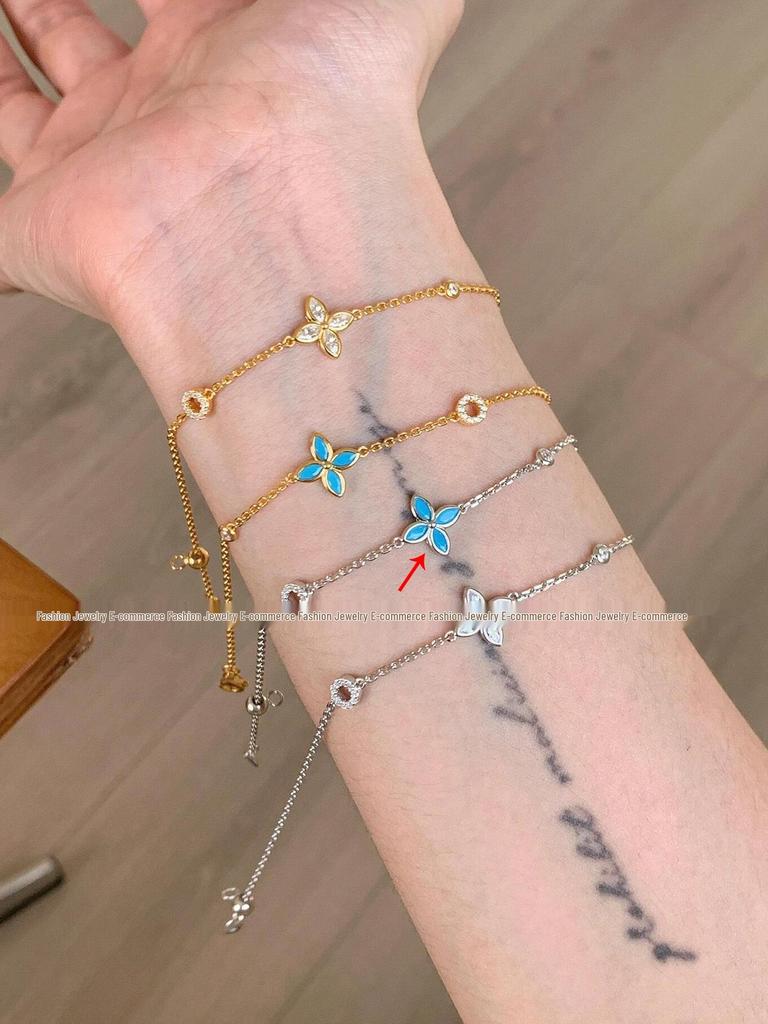 Exquisite Blue Four-Leaf Flower Zircon Bracelet: Versatile, High-Value, Micro-Paved, Stacking Jewelry