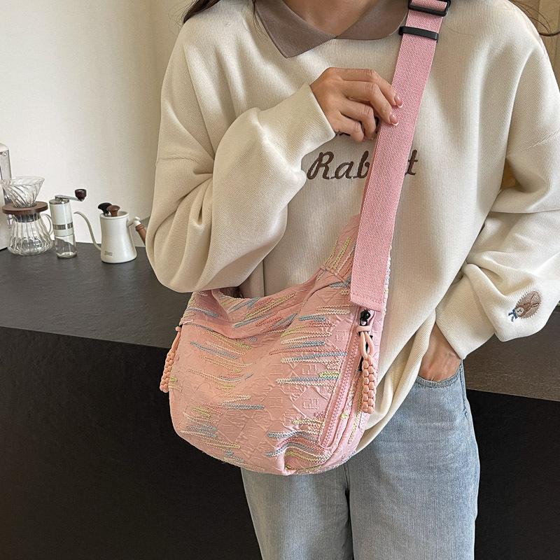 Canvas bag women's large capacity 2025 new summer fashion niche design shoulder messenger bag cloth bag dumpling bag