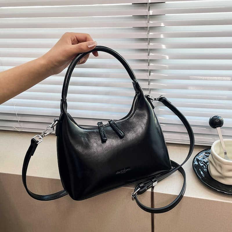 New Underarm Bag Women's Niche Portable Shoulder Bag Simple Sense Fashion Casual Hand Bag Crescent Bag
