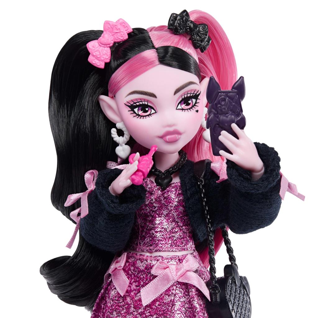 Monster High doll, Dracula ura in a pink bow dress, black cardigan with pet bat count, fabulous, ramen, lipstick, wallet and 7 other accessories,