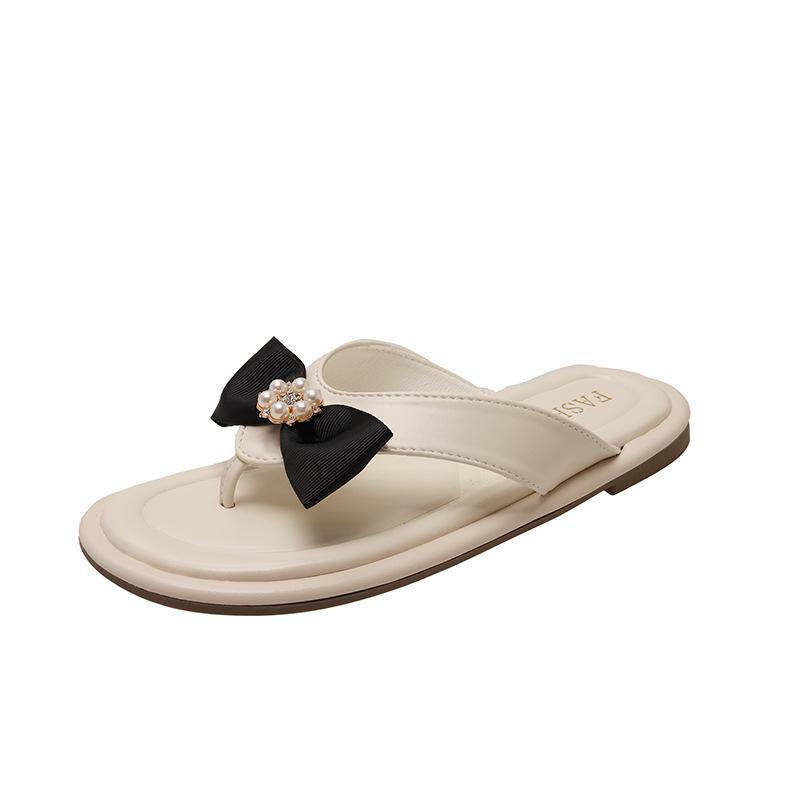 

French fairy slippers female summer wear flat bottom 2025 new summer temperament soft bottom high-end flip-flops 35