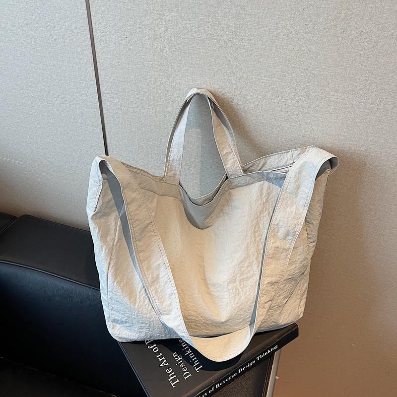

Simple large-capacity canvas bag fashionable new solid color shoulder women s bag casual retro shopping bag handbag грязно-белый