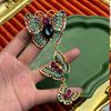 SKEDS Große Broschen mit langen Quasten für Damen Schmetterling Bunte Strasssteine Vintage Schmuck Abendessen Elegante Anstecknadeln