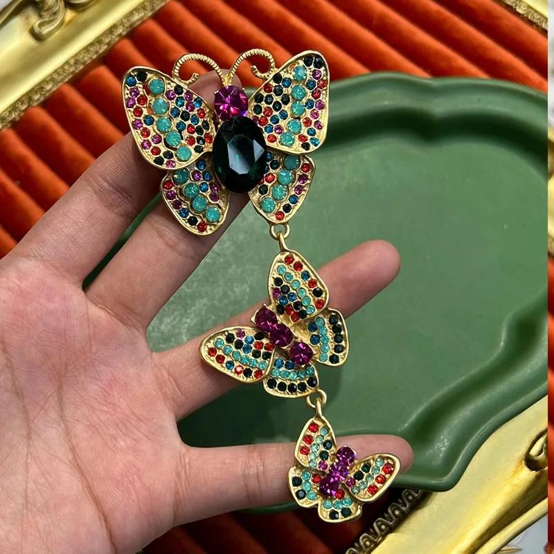 SKEDS Große Broschen mit langen Quasten für Damen Schmetterling Bunte Strasssteine Vintage Schmuck Abendessen Elegante Anstecknadeln