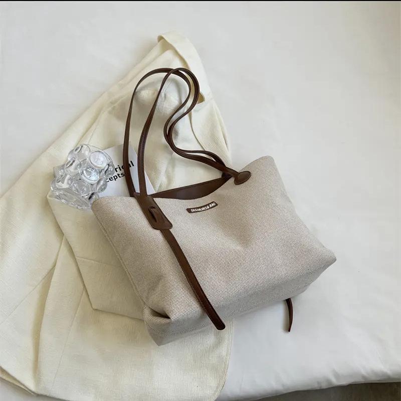 

Women s Versatile Canvas Tote: Large Capacity, Casual Shoulder Handbag for Spring/Summer 2025 темно-коричневого кольору