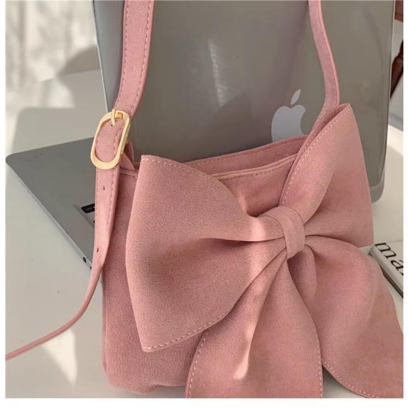 

Autumn and winter new bow girls bag pink sweet wind shoulder bag flannel simple armpit bag розовый