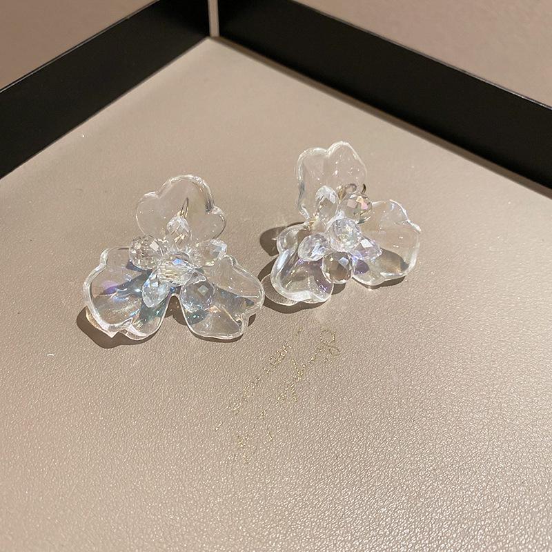 Boucles d'oreilles bohèmes roses à fleurs de perles de rocaille et pompons de perles