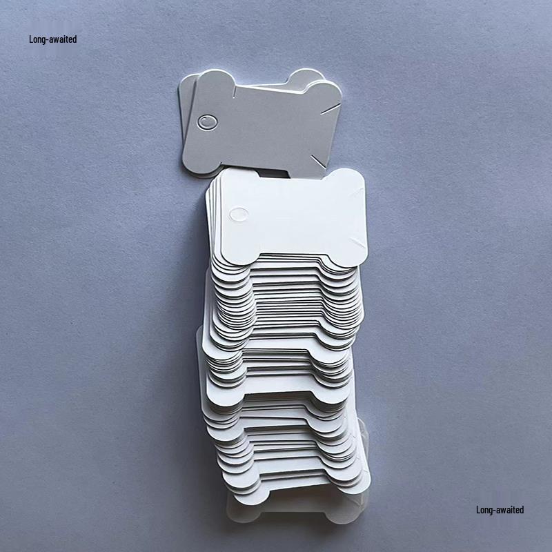 White Paper Thread Bobbins for Cross Stitch Organizing