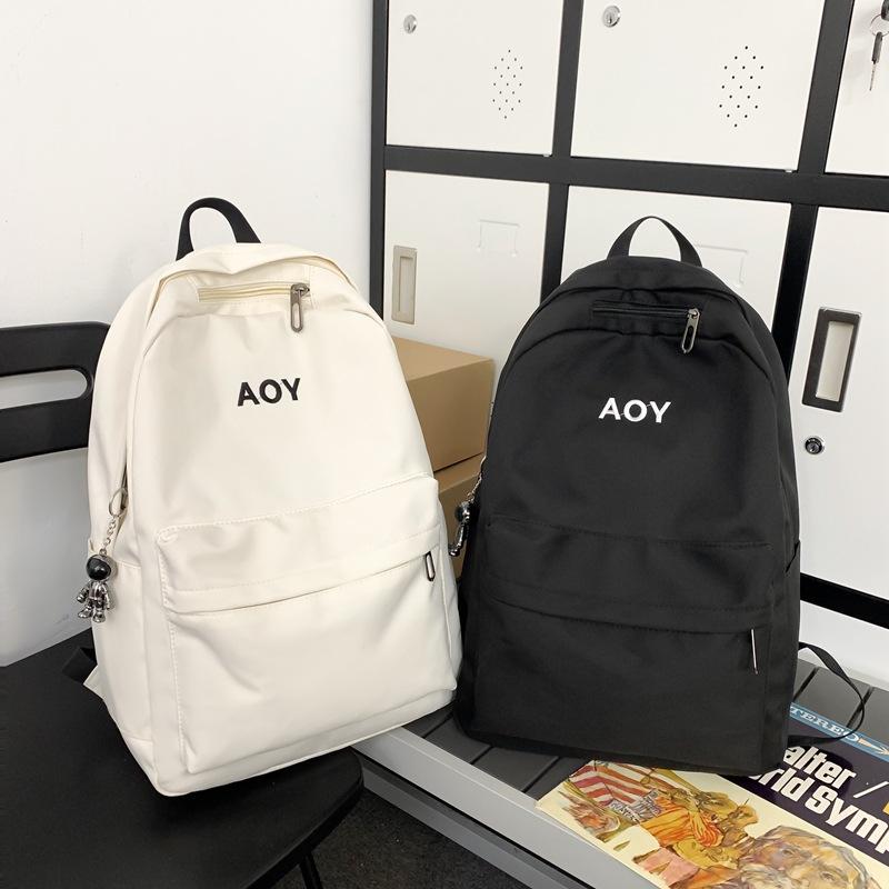 Backpack women's new Korean version Harajuku college student schoolbag student backpack simple solid color large capacity backpack