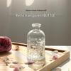 Retro Embossed Transparent Glass Vase: French-Inspired Luxury Home Decor for Living Room