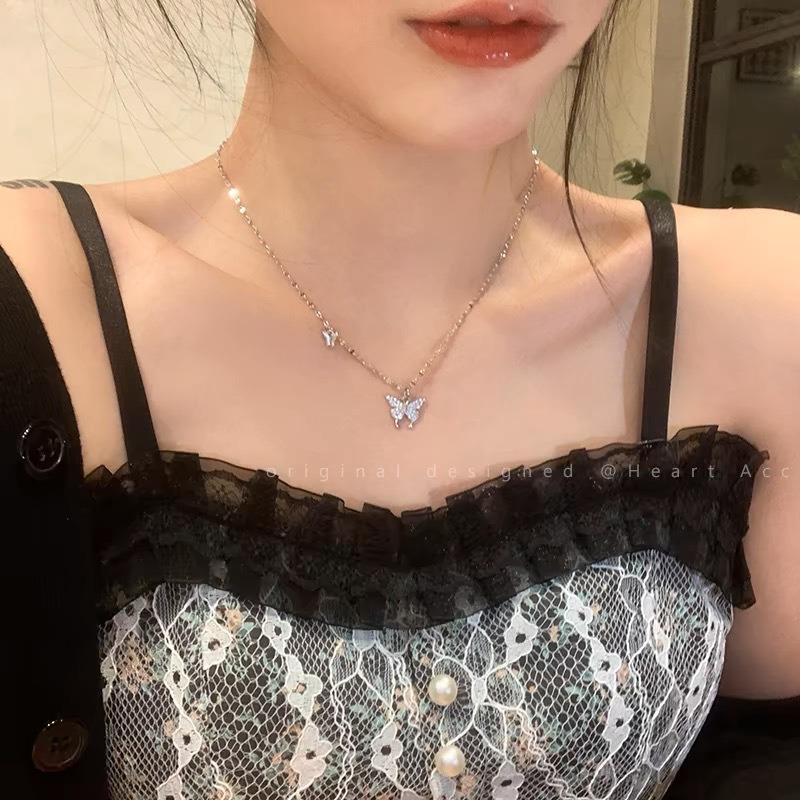 Women's Titanium Steel Bowknot Clavicle Necklace - Niche, Lightweight, Trendy Design.