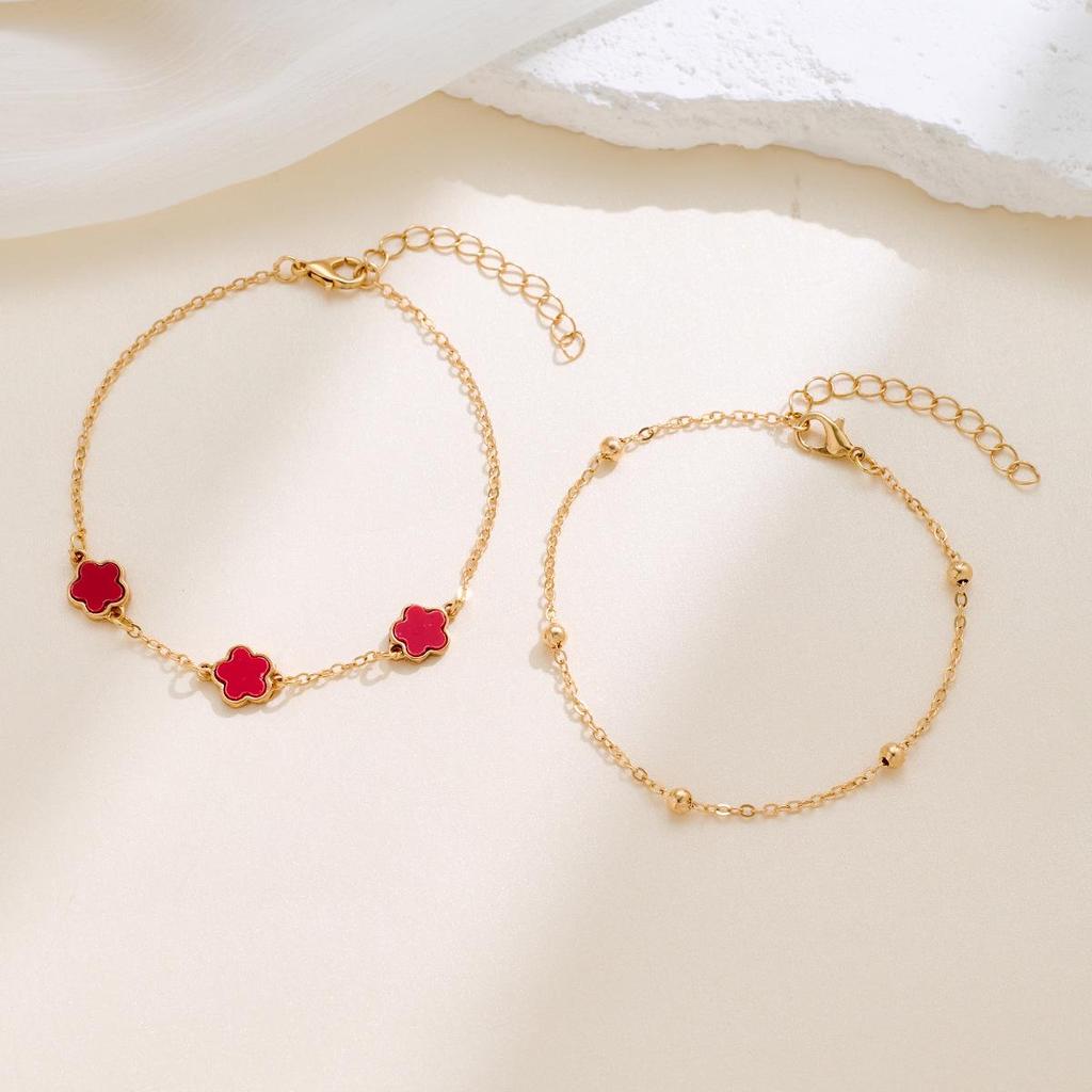 Koreaanse Stijl 4-delige Sieradenset: Bloemenarmband, Ring, Oorbellen met Stud & Klavertje Vier Ketting