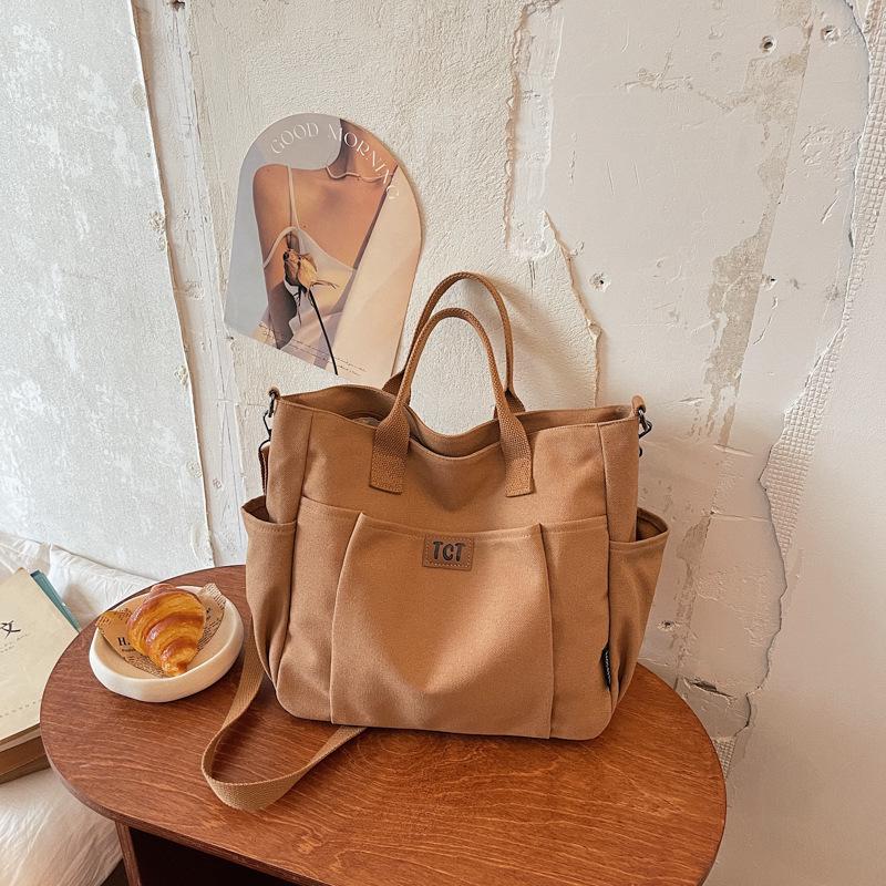 2026 Women's Large Capacity Canvas Tote: Versatile, Fashionable Handheld Shoulder Bag for Commuting
