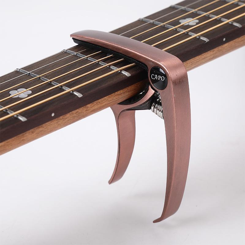 Unisex kovová kapodastra a klipová ladička pro folk, elektrickou kytaru a ukulele