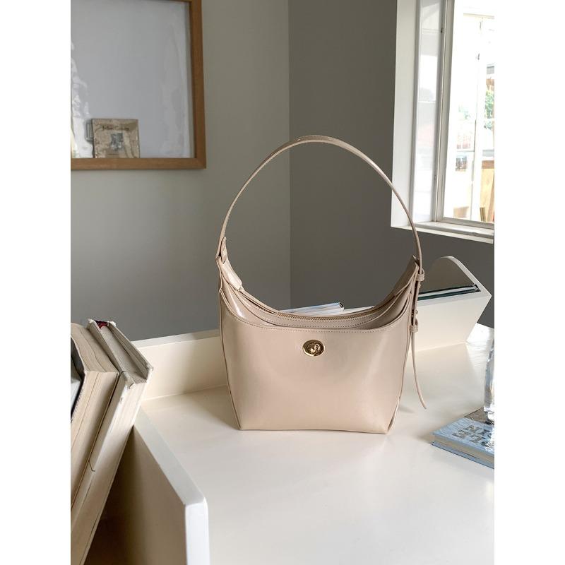 

New handheld shoulder bag women s trendy leather hand bag women s versatile niche underarm bag women абрикосовый