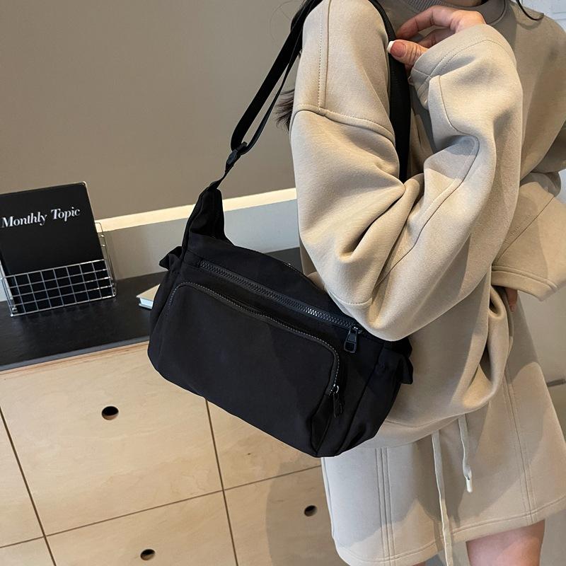 2025 New Casual Simple Canvas Women's Bag Solid Color Casual Shoulder Bag Large Capacity Simple Zipper Messenger Bag Bag