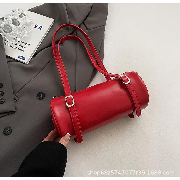 Korean version of the trend drum underarm bag women's 2025 spring new portable baguette bag shoulder bowling commuter bag