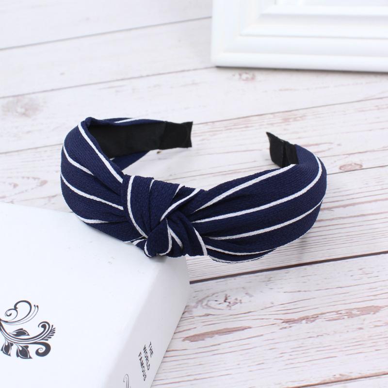 Fabric headband female Yiwu headdress jewelry autumn and winter feeling wide edge versatile high skull top headband hairpin