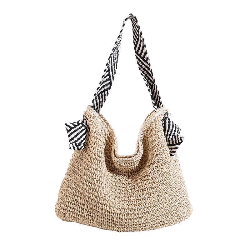 

Holiday Style Straw Woven Bag: Large Capacity, Trendy Single Shoulder with Personalized Strap for Women