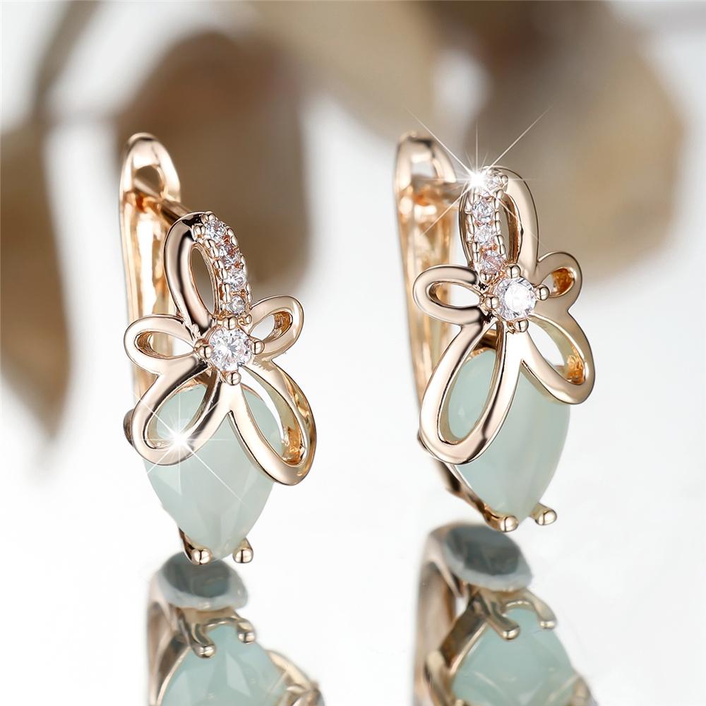 Charme Ohrringe mit weißem Zirkonstein und Blumen-Creolen Luxus Goldfarbe Hochzeits Schmuck für Damen