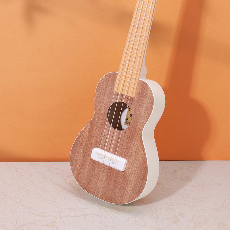 Milky White Peach Core Solid Wood Ukulele with High Aesthetic Appeal