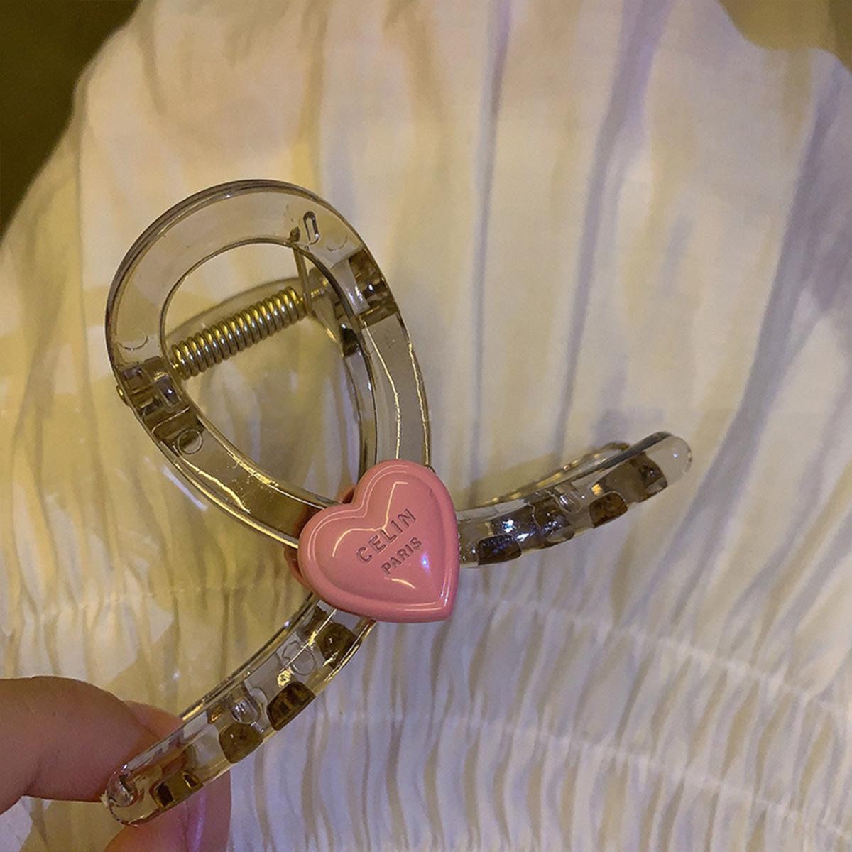 

Super grab, small grab clip, pink love letters, sweet and less hair on the back of the head, shark clip ins wind hairpin.