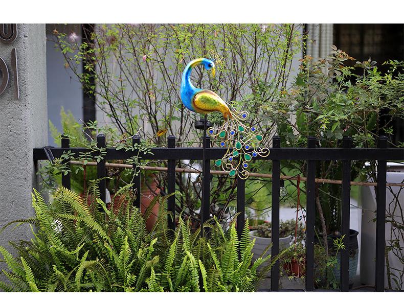 Solar Peacock Light: Waterproof Wrought Iron Garden Ornament for Lawn and Courtyard.